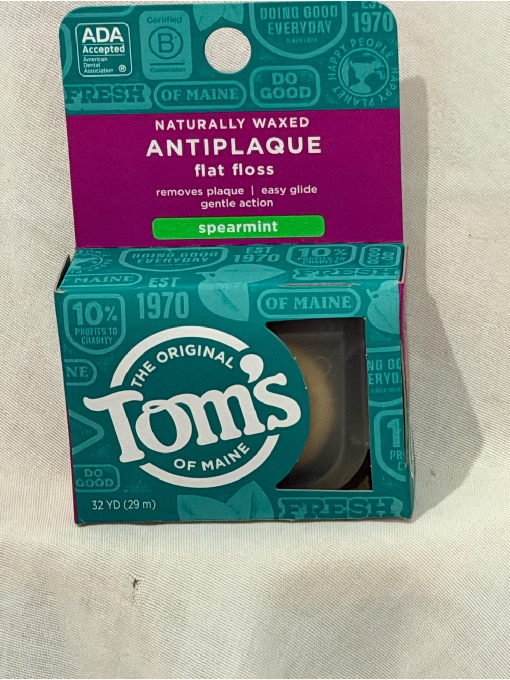 Tom's of Maine Antiplaque Spearmint Flat Floss - Teal & Magenta Packaging